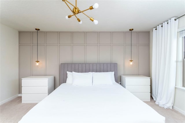 unfurnished bedroom with light carpet and a textured ceiling