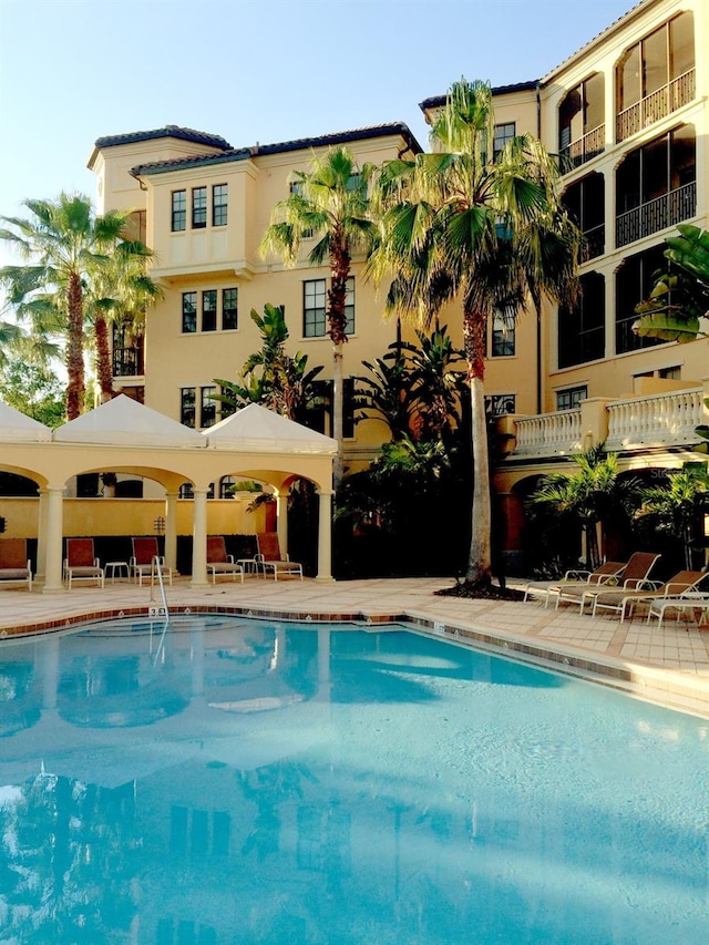 view of pool with a gazebo and a patio