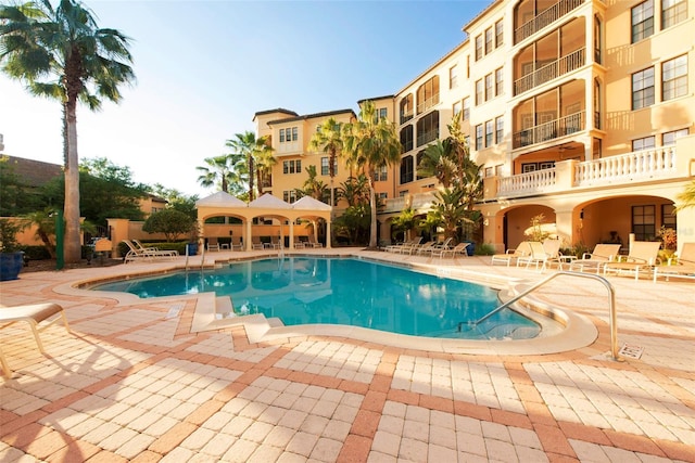 view of pool featuring a patio