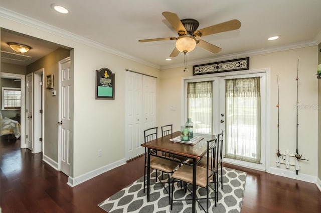 dining room featuring plenty of natural light, french doors, and dark hardwood / wood-style flooring