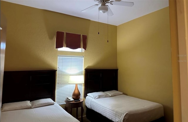 bedroom featuring ceiling fan