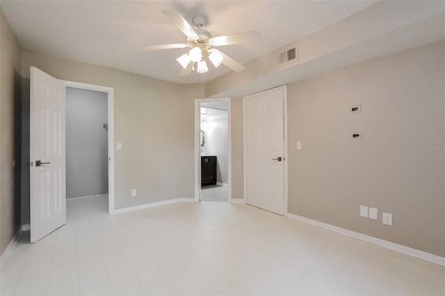 spare room with ceiling fan