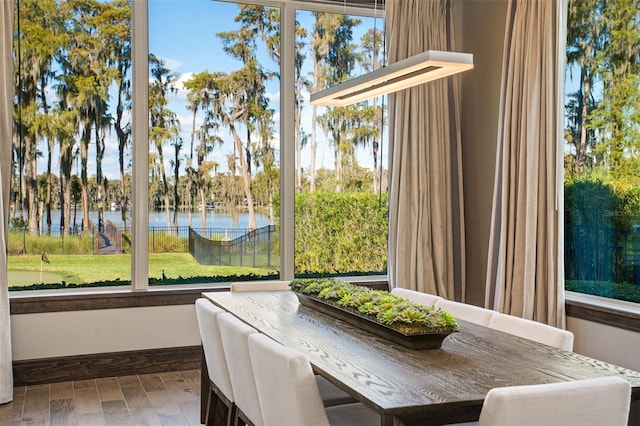 sunroom with a water view