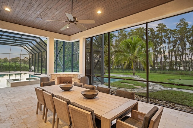 6109 Orta Ct, Windermere, FL 34786 - sunroom / solarium with ceiling fan and outdoor dining space