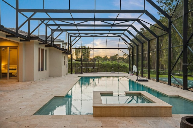 6109 Orta Ct, Windermere, FL 34786 - view of pool with a patio, a pool with connected hot tub, and glass enclosure
