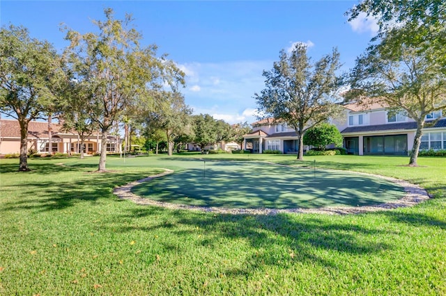 view of community featuring a lawn