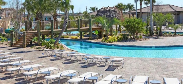 view of swimming pool featuring a patio