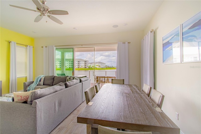 dining space featuring ceiling fan