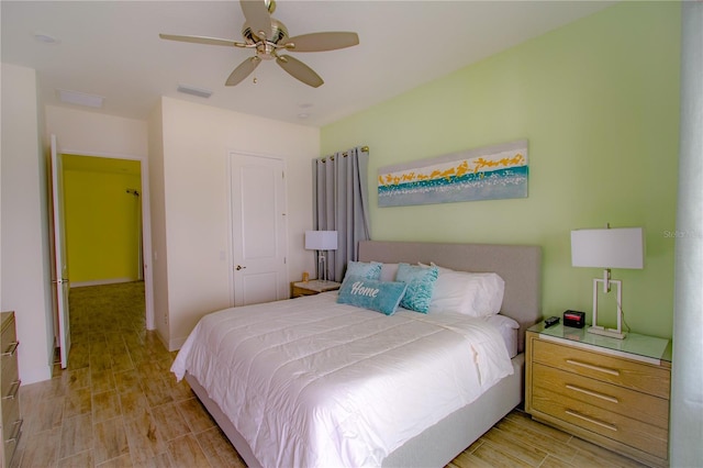 bedroom featuring a closet and ceiling fan