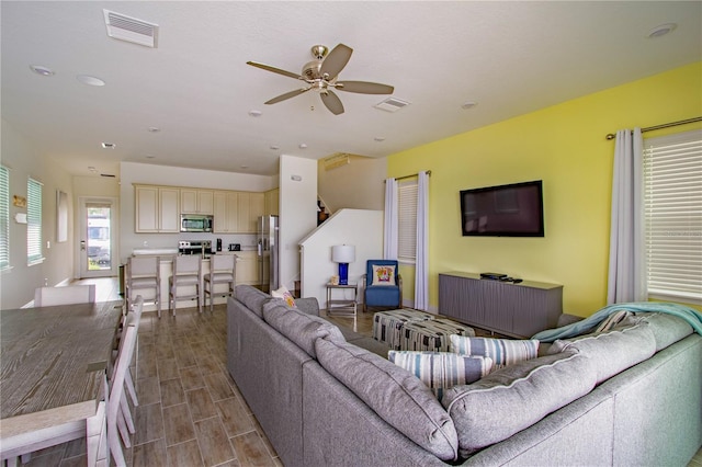 living room with ceiling fan