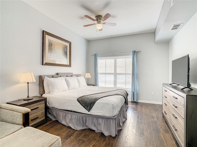 bedroom featuring ceiling fan and dark hardwood / wood-style floors