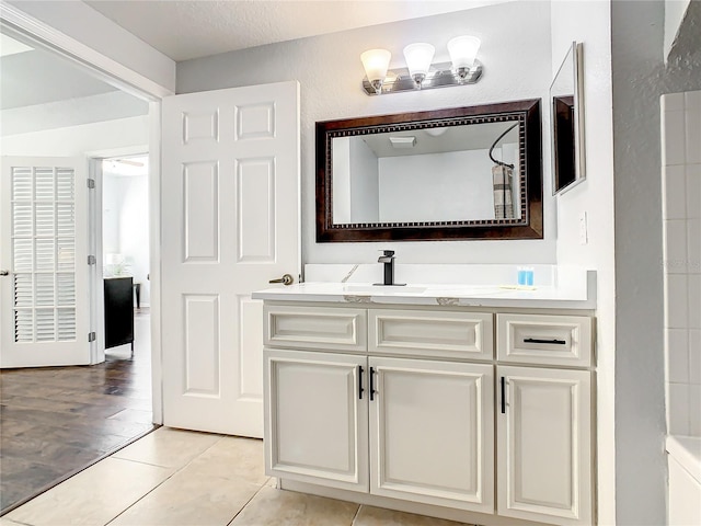 bathroom featuring vanity and hardwood / wood-style flooring