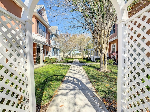 surrounding community featuring a lawn