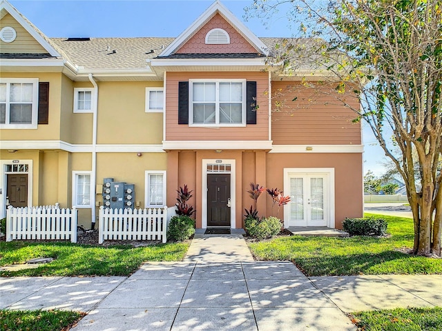 townhome / multi-family property with french doors