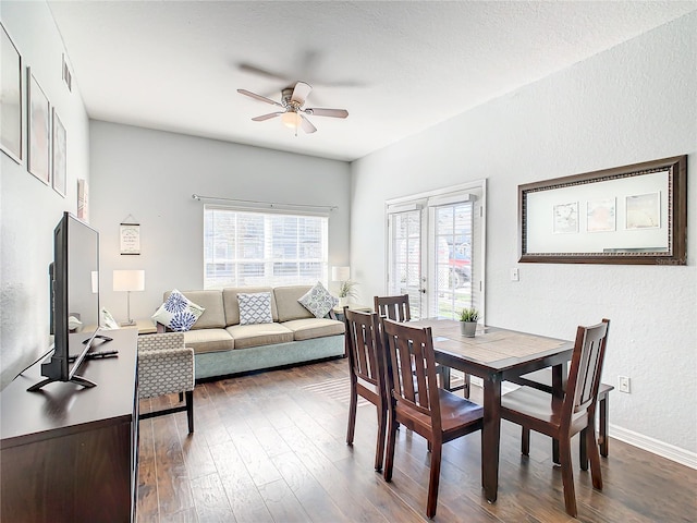 dining area with french doors, ceiling fan, wood-type flooring, and a wealth of natural light