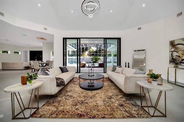 living room featuring concrete flooring