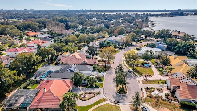 birds eye view of property featuring a water view