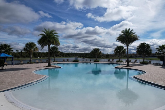 view of pool featuring a patio area