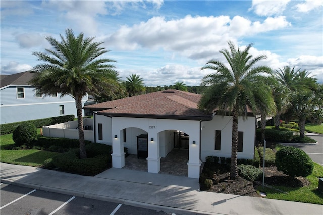 exterior space featuring a carport