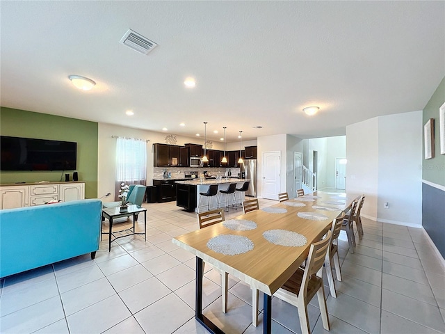 view of tiled dining space