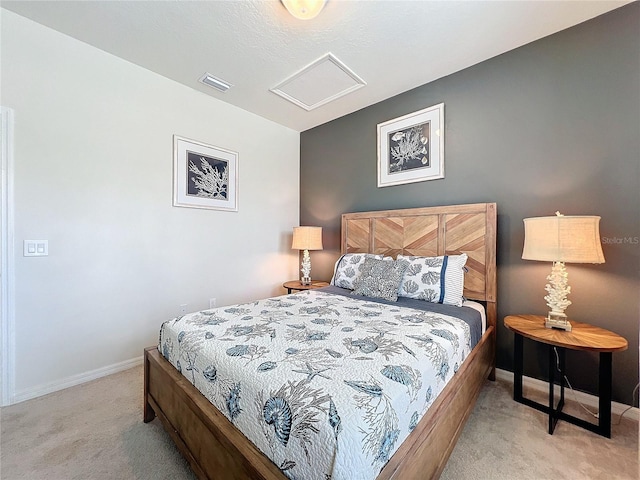 bedroom featuring light carpet