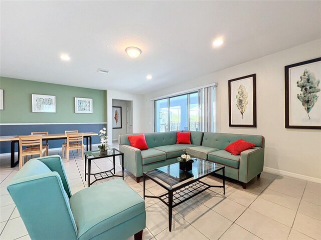 living room featuring tile floors