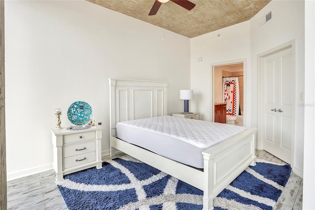 bedroom featuring light hardwood / wood-style floors and ceiling fan