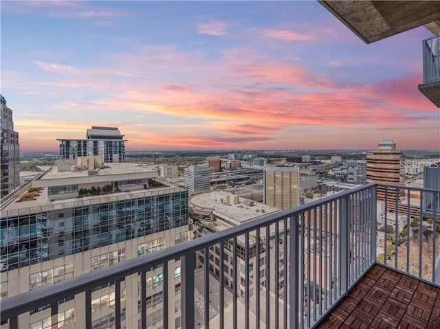 view of balcony at dusk