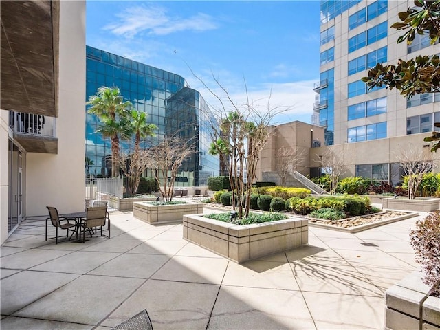 view of property's community featuring a patio