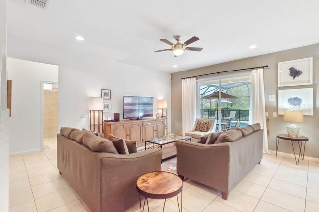 living room with light tile patterned floors and ceiling fan