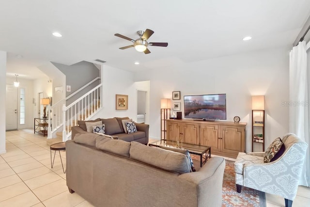 5220 Oakbourne Ave, Davenport, FL 33837 - living area featuring stairway, ceiling fan, light tile patterned floors, and recessed lighting