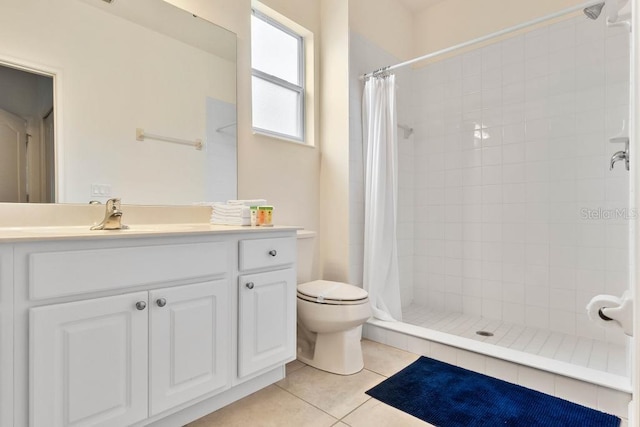 5220 Oakbourne Ave, Davenport, FL 33837 - bathroom featuring a tile shower, vanity, and tile patterned flooring