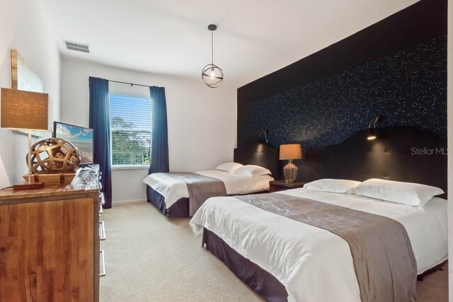5220 Oakbourne Ave, Davenport, FL 33837 - bedroom with carpet flooring and baseboards