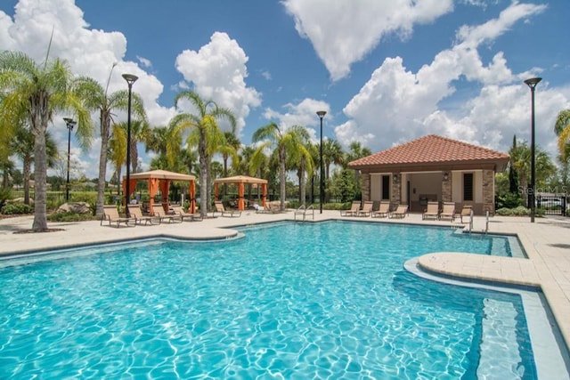 5220 Oakbourne Ave, Davenport, FL 33837 - community pool with a gazebo and a patio