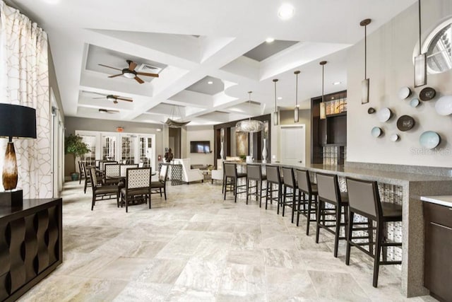 5220 Oakbourne Ave, Davenport, FL 33837 - kitchen with coffered ceiling, a ceiling fan, beam ceiling, recessed lighting, and dark brown cabinetry