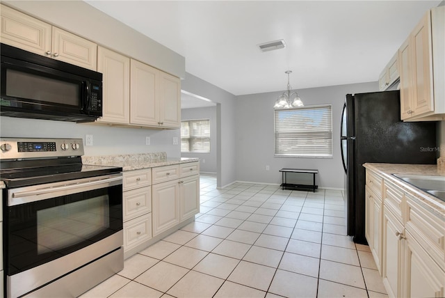 kitchen featuring black appliances, sink, light tile patterned floors, decorative light fixtures, and a chandelier