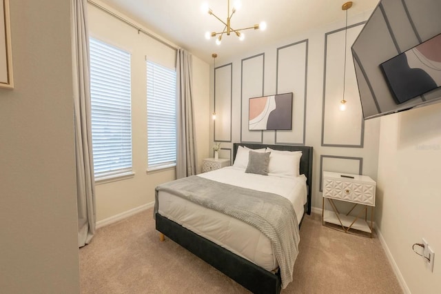 4189 Lana Ave, Davenport, FL 33897 - bedroom featuring a notable chandelier, baseboards, and light carpet