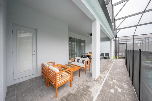 4189 Lana Ave, Davenport, FL 33897 - view of patio / terrace featuring a lanai, a ceiling fan, and an outdoor hangout area