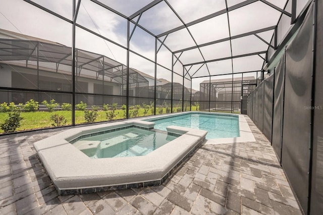 4189 Lana Ave, Davenport, FL 33897 - view of pool featuring a lanai, a pool with connected hot tub, and a patio