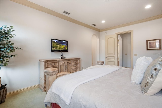 carpeted bedroom with crown molding