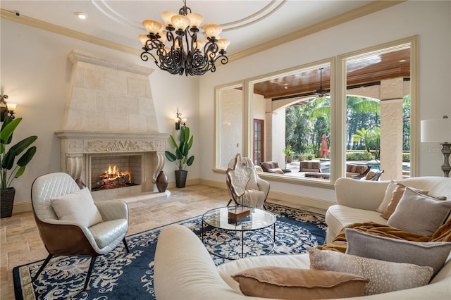 living room featuring a fireplace, a chandelier, and ornamental molding