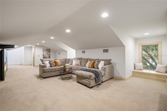 living room with lofted ceiling and light carpet