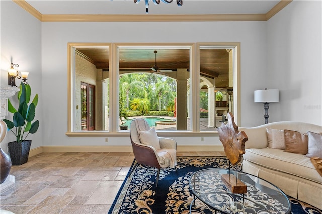 living room featuring crown molding and a healthy amount of sunlight