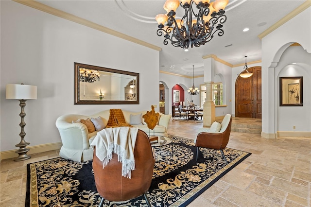 living room featuring a chandelier and crown molding