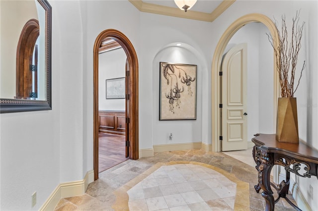 hallway featuring crown molding