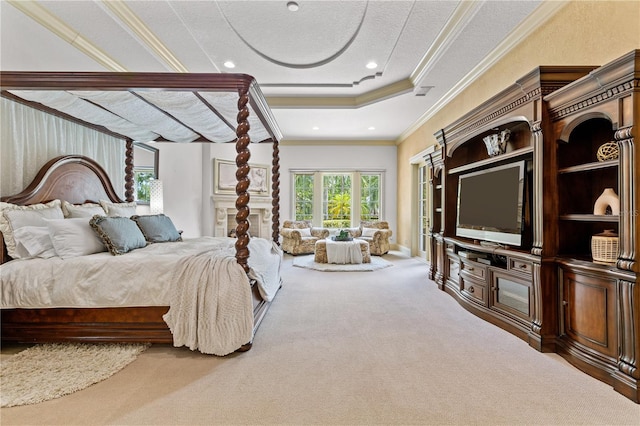 carpeted bedroom featuring ornamental molding and a textured ceiling