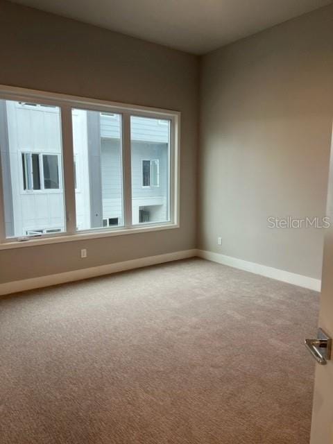 view of carpeted empty room