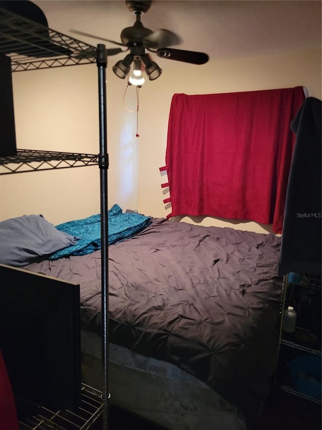 bedroom featuring ceiling fan