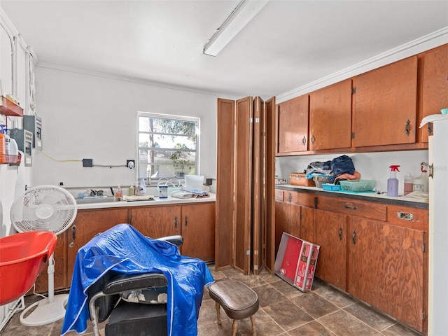 kitchen with dark tile patterned flooring