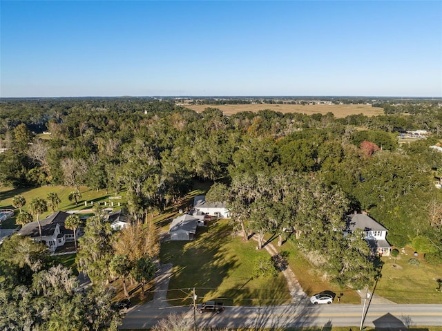 aerial view featuring a forest view